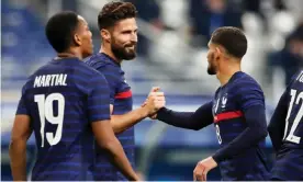  ??  ?? Olivier Giroud celebrates scoring France’s third goal against Ukraine, which helped the striker surpass Michel Platini in his country’s scoring charts. Photograph: Benoît Tessier/