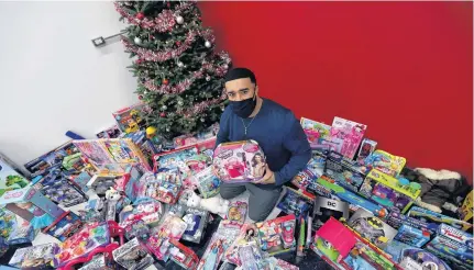  ?? ERIC WYNNE • THE CHRONICLE HERALD ?? Cedric (Ceddy) Dechamp, originally from Uniacke Square, is the owner of Legends Barbershop­s in Dartmouth and Cole Harbour. He is organizing a toy drive to give back to underprivi­leged families over the holidays.