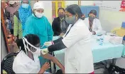  ?? HT PHOTO ?? A health worker getting vaccinated at a centre in Prayagraj on Thursday.