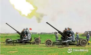  ?? — eng.chinamil.com.cn/Shang Wenbin ?? On target: The PLA recently held a series of anti-aircraft drills off the South China Sea.