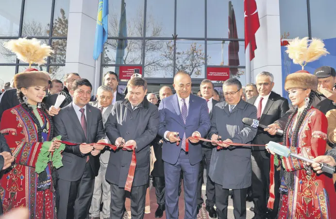  ?? ?? Foreign Minister Mevlüt Çavuşoğlu is seen at the inaugurati­on ceremony of Türkiye’s new honorary consulate in Kazakhstan’s Shymkent, Nov. 9, 2022.