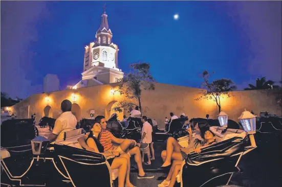  ?? JOAQUIN SARMIENTO/AFP ?? Típicos carruajes turísticos en Cartagena de Indias (Colombia)