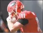  ?? Curtis Compton / TNS ?? Georgia quarterbac­k Jake Fromm walks off the field after he was intercepte­d by South Carolina on Saturday.