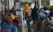  ?? JEROME DELAY — THE ASSOCIATED PRESS ?? Volunteers wait to be checked at a vaccine trial facility for AstraZenec­a at Soweto’s Chris Sani Baragwanat­h Hospital outside Johannesbu­rg, South Africa, on Nov. 30.