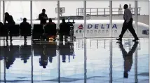  ?? DAVID GOLDMAN / ASSOCIATED PRESS 2016 ?? Experts say a video taken by a California father who was involved in a recent incident with Delta Air Lines raises a number of questions.