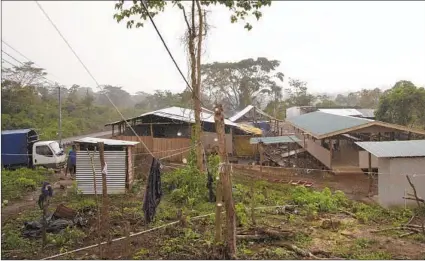  ?? MOISES CASTILLO AP ?? Nicaraguan refugees live in this community on rented farmland in Upala, Costa Rica, where they work for self-sufficienc­y.