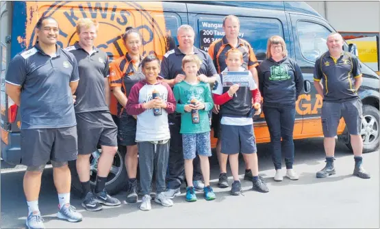  ?? PICTURE / PAUL BROOKS ?? Outside Mitre 10 Mega Wanganui are (from left, back)) Ene Fa’atau and Simon Dibben, Wanganui Rugby developmen­t officers; Paula Fore, Mitre 10 Mega marketing, promotions and events co-ordinator; Jerome McRea, referee educator; Hayden Gibson, store owner; Kylee Campbell, Marist junior co-ordinator; Dave Pedley, Pirates club captain. In front are Gibson Uruamo (left), Justin Falconer and Te Arahi Williams from Tawhero School.