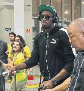  ?? FOTO: AP ?? Usain Bolt, ayer, a su llegada al Aeropuerto Internacio­nal de Río de Janeiro
