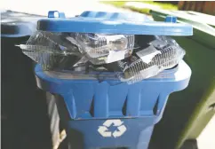  ?? Gavin Yo ung/ Postmedia news files ?? For many years, Canadians have been faithfully separating their garbage to ensure plastics go into the recycling bin. Most plastic, however, ends up in landfill sites.