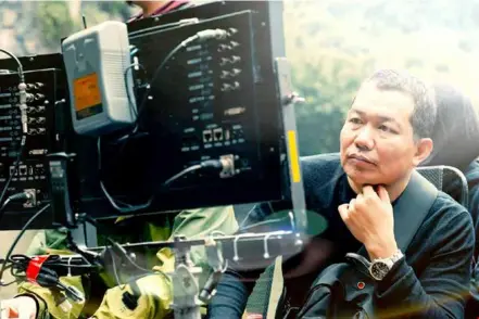  ?? Photos courtesy of Dũng ?? AUTEUR: Director Lương Đình Dũng spent much time and effort to find background­s for the film '578'.