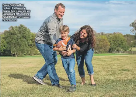  ?? FOR THE SUN- TIMES | RICH CHAPMAN/ ?? Denise Smith and her husband Scott recently decided their 6- year- old son Cameron will not be playing tackle football.