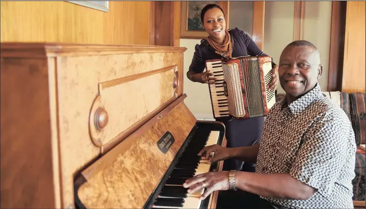  ?? PHOTOGRAPH: PHANDO JIKELO/AFRICAN NEWS AGENCY/ANA ?? Award-winning television and radio personalit­y and mom-trepreneur Elana Afrika-bredenkamp with her inherited accordion at her parents’ house in Bellville. Her father, Hennie Afrika, taught her to play the piano and the accordion.