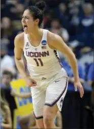  ?? JESSICA HILL — THE ASSOCIATED PRESS ?? UConn’s Kia Nurse reacts after a basket during the first half of a regional semifinal game against UCLA. Nurse will try and contain Mississipp­i State guard Morgan William in Friday’s national semifinal.