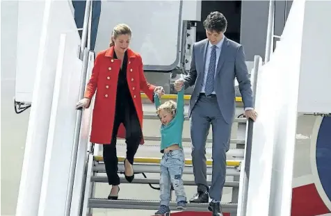  ?? MORRIS MACMATZEN/GETTY IMAGES ?? Prime Minister of Justin Trudeau with wife Sophie Trudeau and their youngest son Hadrien arrive at Hamburg Airport for the G20 economic summit on Thursday in Hamburg, Germany. Leaders of the G20 group of nations are meeting for the July 7-8 summit....
