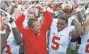  ?? KYLE ROBERTSON/COLUMBUS DISPATCH ?? Urban Meyer loved star QB Braxton Miller and the 2012 Buckeyes.