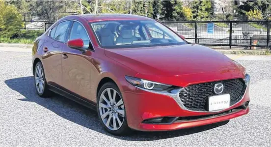  ?? ANDREW MCCREDIE/POSTMEDIA ?? The all-wheel-drive Mazda3 GT represents just one of a number of 2020 models that puts to rest the notion that sedans are yesterday’s vehicles.