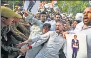  ?? BURHAAN KINU/HT PHOTO ?? Youth Congress members clash with police during an antiBJP protest over PNB fraud in Delhi on Wednesday.