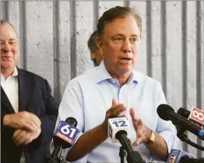 ?? Ned Gerard / Hearst Connecticu­t Media file photo ?? Commitment­s by Gov. Ned Lamont and Lt. Gov. Susan Bysiewicz won them the cross endorsemen­t of the Griebel-Frank for Connecticu­t Party, supporters announced on Wednesday.