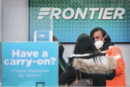  ?? Photo: VCG ?? Passengers check in for flights on Frontier Airlines at O’Hare Internatio­nal Airport in Chicago, on February 07, 2022.