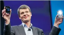  ?? MARIO TAMA/GETTY IMAGES ?? BlackBerry chief executive officer Thorsten Heins displays the new BlackBerry 10 smartphone­s at a launch in New York on Wednesday.