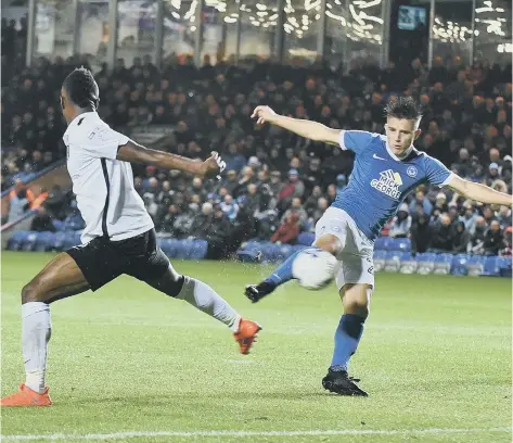  ??  ?? Posh striker Tom Nichols scores his first goal in 13 outings.