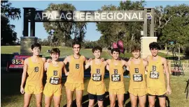  ?? COURTESY ?? The Belen boys’ cross-country team gave coach Frankie Ruiz a state-record 11th title.