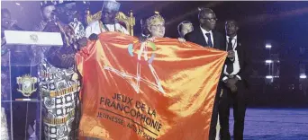  ??  ?? La ministre libérale Francine Landry s’était rendue en Côte d’Ivoire en 2017 afin d’accepter le drapeau des Jeux de la Francophon­ie. - Archives