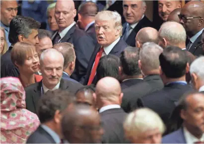  ?? SETH WENIG/AP ?? President Donald Trump makes his way through diplomats and others after a meeting Monday during the United Nations General Assembly at U.N. headquarte­rs in New York City.