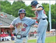  ?? THOMAS NASH — DIGITAL FIRST MEDIA ?? Spring City’s Coy Walters, left, and Brad Clemens celebrate after both scored on Nick Price’s two-run double during the fourth inning against Souderton on Wednesday.