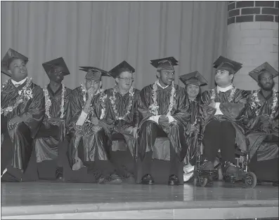  ?? SUBMITTED PHOTO ?? Charles County Public Schools honored eight student graduates of the Adult Independen­ce Program, known as AIP, in a ceremony held May 19 at North Point High School. The program provides job and career training for students ages 18 to 21. Celebrated in...