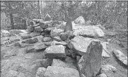  ?? STEVE FAGIN/SPECIAL TO THE DAY ?? Stone chairs provide trailside seating on a ridge along the trail.
