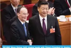  ?? — AFP ?? BEIJING: Wang Qishan (left) shakes hands with China’s President Xi Jinping after Wang was elected as China’s Vice President during the 13th National People’s Congress at the Great Hall of the People yesterday.