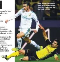  ?? AFPPIX ?? Real Madrid’s Gareth Bale and Dortmund’s Sokratis (right) vie for the ball . –