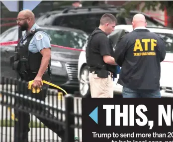  ?? SCOTT OLSON/GETTY IMAGES ?? An ATF agent and Chicago police on Wednesday investigat­e the scene where 15 people were shot the day before.