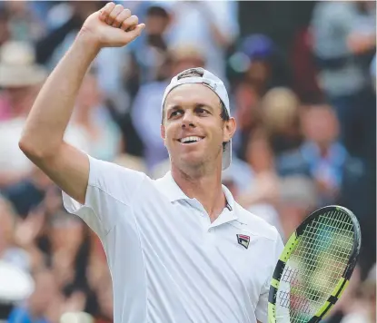  ?? STEP UP: Sam Querrey celebrates beating Britain's Andy Murray in their men's singles quarter- final match at Wimbledon. ??