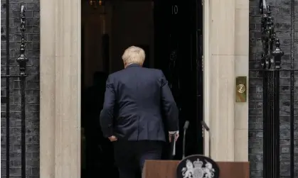  ?? Photograph: Alberto Pezzali/AP ?? Boris Johnson enters 10 Downing Street after reading his resignatio­n statement on Thursday.