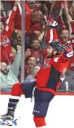  ??  ?? The Capitals’ Tom Wilson celebrates after scoring the winning goal in overtime.
| GETTY IMAGES