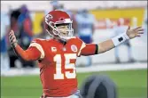  ?? REED HOFFMANN / AP ?? Kansas City Chiefs quarterbac­k Patrick Mahomes celebrates as time winds down in their victory over the Buffalo Bills in AFC Championsh­ip on Sunday in Kansas City, Mo.