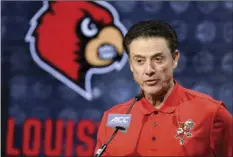  ??  ?? In this Oct. 26 file photo, Louisville NCAA college basketball head coach Rick Pitino answers a question during the Atlantic Coast Conference media day in Charlotte, N.C. AP PHOTO