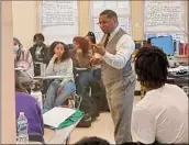  ?? Stephen Smith / Associated Press ?? Emmitt Glynn teaches his second AP African American studies class Monday at Baton Rouge Magnet High School in Louisiana. The school is one of 60 across the U.S. testing the new course, which has gained national attention since it was banned in Florida.