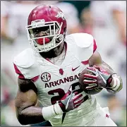  ?? NWA Democrat-Gazette/JASON IVESTER ?? Running back Rawleigh Williams, shown earlier Saturday, went down without being tackled Saturday during the Hogs’ final spring practice. Medical personnel used extreme caution with Williams, who suffered a neck injury against Auburn in 2015 and lost...