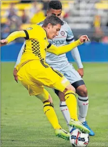  ?? [ERIC ALBRECHT/DISPATCH] ?? Crew SC midfielder Ethan Finlay has the ball against the Chicago Fire in the season opener, in which he scored his only goal of the season. Finlay scored 11 in 2014, 12 in 2015 and six in 2016.