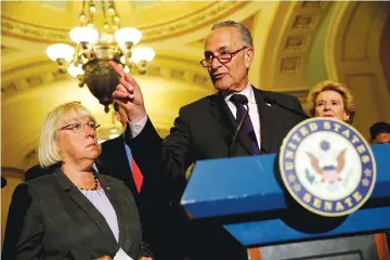  ?? — Reuters photo ?? Senate Minority Leader Chuck Schumer, accompanie­d by Senator Patty Murray and Senator Debbie Stabenow speaks with reporters following the successful vote to open debate on a health care bill on Capitol Hill in Washington, US.