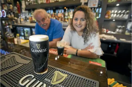  ?? GRANT MATTHEW/STUFF ?? Irish pub owner Bertie Burleigh taught reporter Jane Matthews his Guinness-pouring ways.