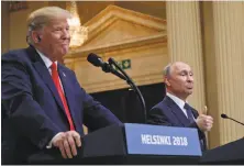  ?? Pablo Martinez Monsivais / Associated Press ?? The special relationsh­ip of Russian President Vladimir Putin, right, and President Donald Trump was on display at this July 16 news conference at the Presidenti­al Palace in Helsinki.