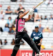  ?? GETTY IMAGES ?? Suzie Bates jumps to play a shot during the White Ferns T20 match against India in Auckland yesterday.