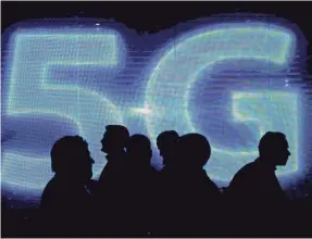  ?? AFP/GETTY IMAGES ?? 5G promises to deliver super-fast connection­s for smartphone­s.