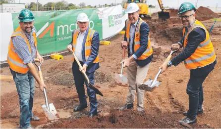  ?? ?? WORK STARTED: Turning sod at the site of the new Highfields Library are (from left) McNab senior project manager Ryan Smith, Mayor Paul Antonio, Groom MP Garth Hamilton and McNab marketing manager Steve Kelk.