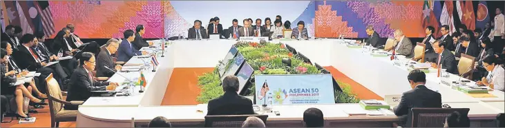  ??  ?? Asean foreign ministers take part in a meeting of the 50th Associatio­n of Southeast Asian Nations Foreign Ministers Meeting (AMM) at the Philippine Internatio­nal Convention Centre in Manila. — AFP photo