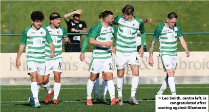  ??  ?? Leo Smith, centre left, is congratula­ted after scoring against Glentoran